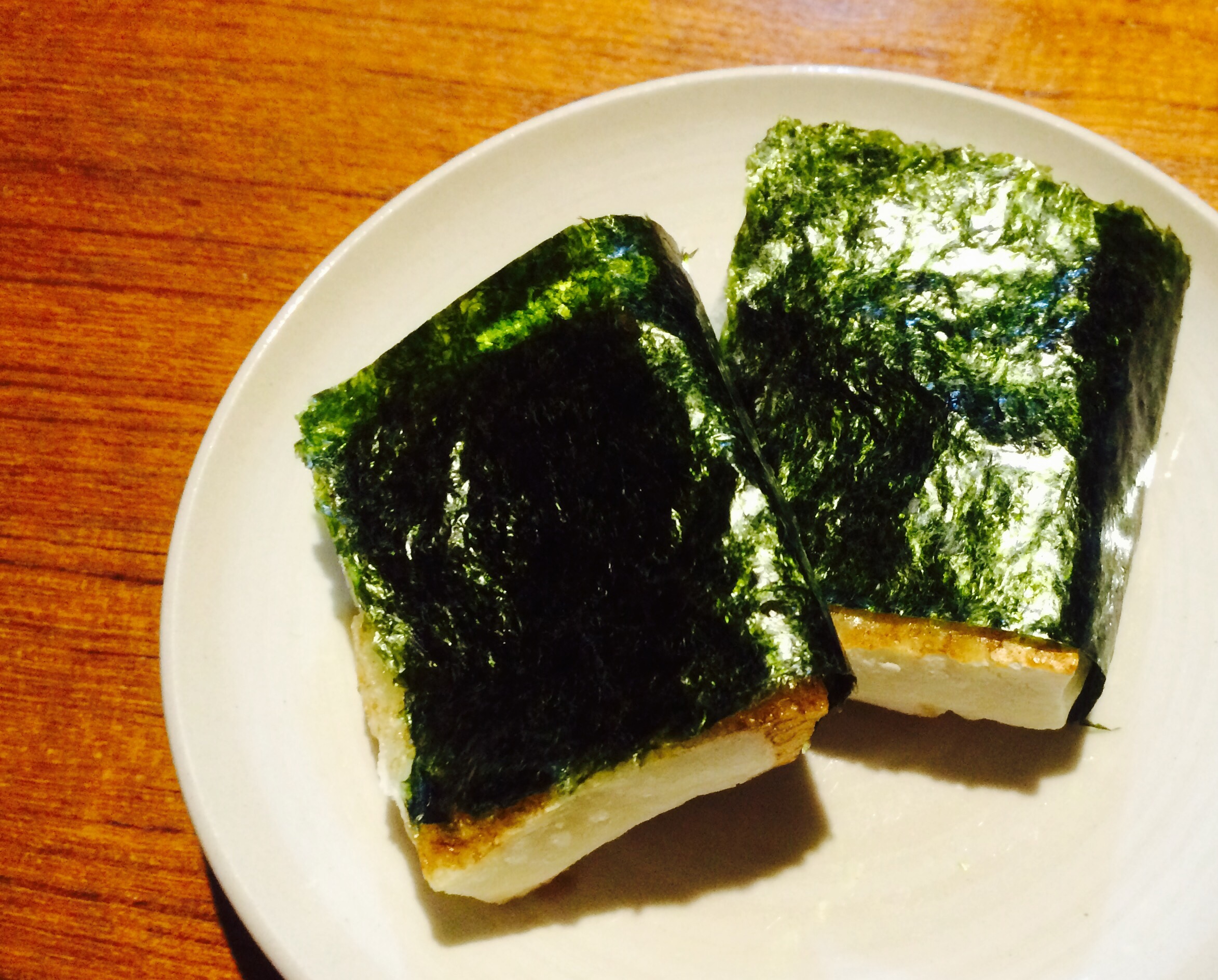 Isobe-yaki (Baked mochi wrapped in Nori seaweed) .
